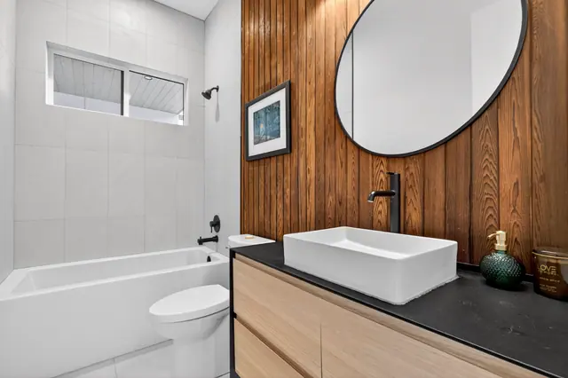 Bathroom, modern lake-view home in Lake Country, BC. Real estate photography by Pixel Pro Productions.