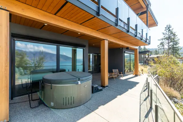 Hot tub deck, lake-view modern home in Lakestone, Lake Country, BC. Real estate photography by Pixel Pro Productions.