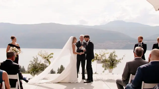 Lakeside ceremony: Emily & Connor's wedding at 50th Parallel Estate, Lake Country. Still from the Pixel Pro wedding film.