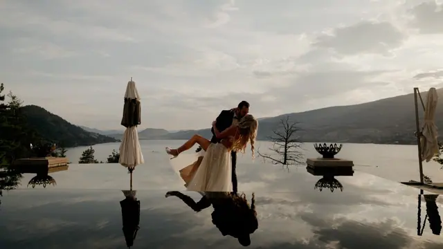 Infinity pool reflection: Kiana & Nick's wedding at Chateau Okanagan, Kelowna. Still from the Pixel Pro wedding film.