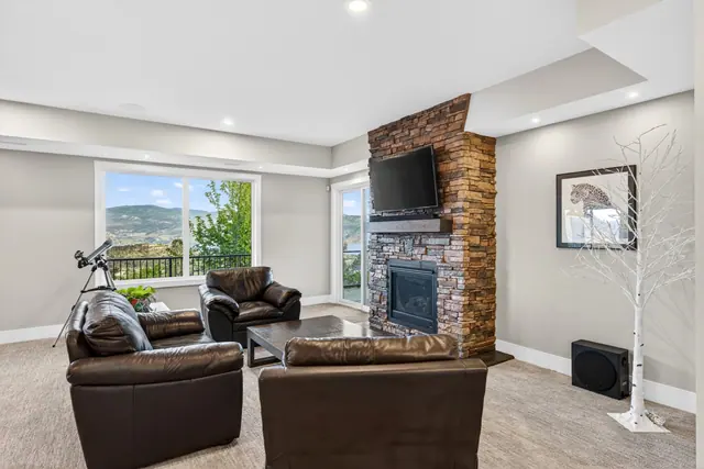 Family room, lake-view family home in West Kelowna, BC. Real estate photography by Pixel Pro Productions.