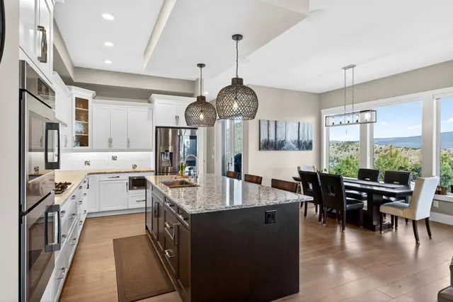 Kitchen, lake-view family home in West Kelowna, BC. Real estate photography by Pixel Pro Productions.