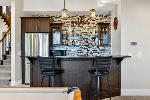 Wet bar, lake-view family home in West Kelowna, BC. Real estate photography by Pixel Pro Productions.