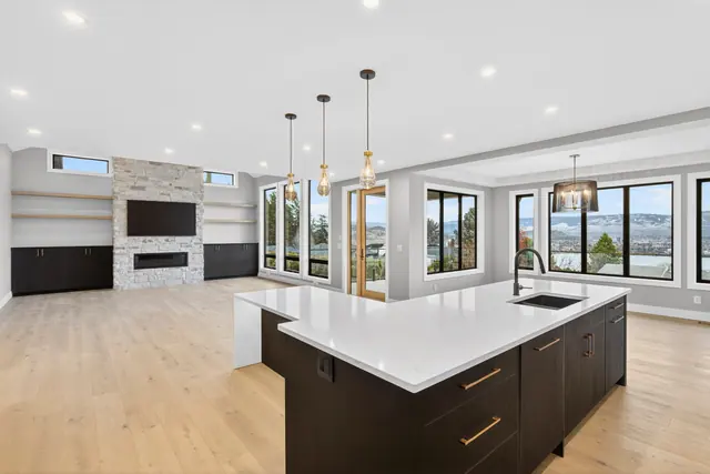 Kitchen living, new-build lake-view home in West Kelowna, BC. Real estate photography by Pixel Pro Productions.